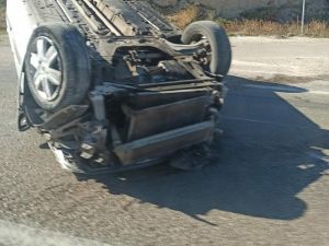 Takla Atan Otomobilden Hafif Yaralı Kurtuldu