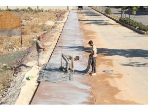 Döşemealtı’na renkli baskı beton kaldırım