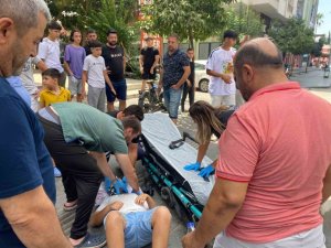 DEVRİLEN ELEKTRİKLİ BİSİKLETİN SÜRÜCÜSÜ ÇOCUK YARALANDI
