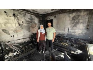 EVLERİ YANGINDA KÜLE DÖNDÜ, AİLE CANINI ZOR KURTARDI