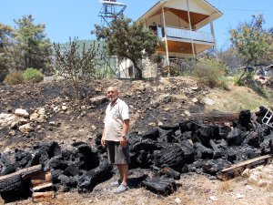 EMEKLİ İTFAİYECİ EVİNİ YANMAKTAN KURTARDI