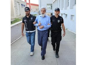 ALPARSLAN KUYTUL, KENDİNDEN HABERSİZ HAREKET EDEN ÖRGÜT ÜYESİNİN SIRTINDA SOPA KIRMIŞ