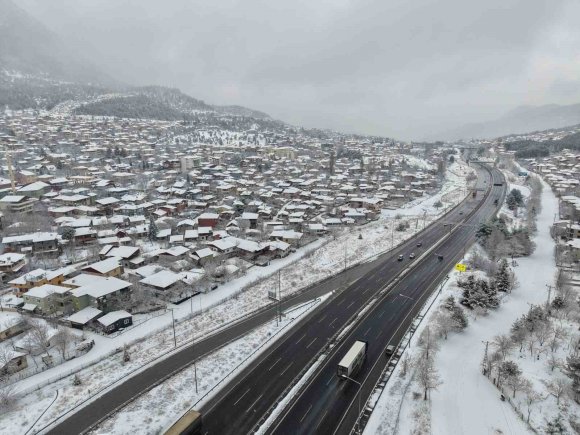 POZANTI BEYAZA BÜRÜNDÜ